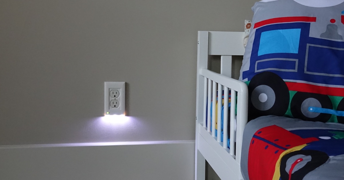 DSC00056 briteOWL® LED outlet cover installed on wall in kid's bedroom